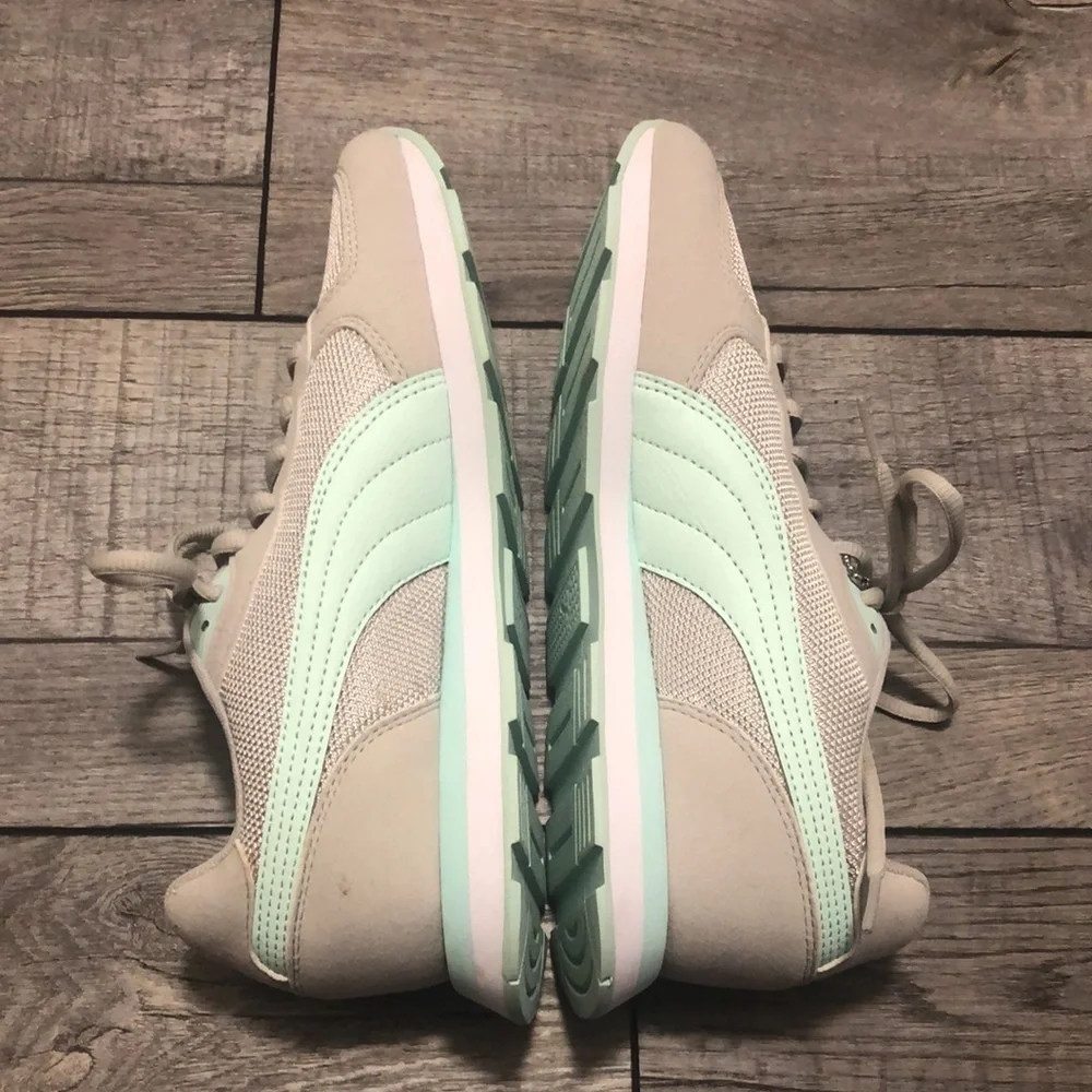 Puma retro runner sneakers in mint and light grey with soft foam support inserts